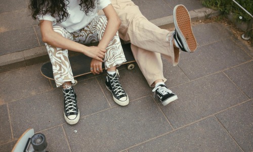 a couple of people sitting on a bench