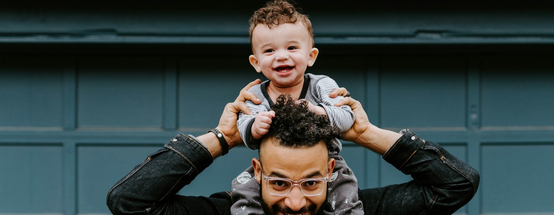 a man holding a child