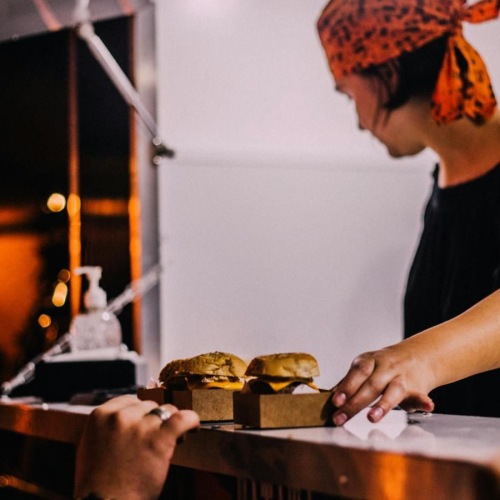 a man cutting a cake